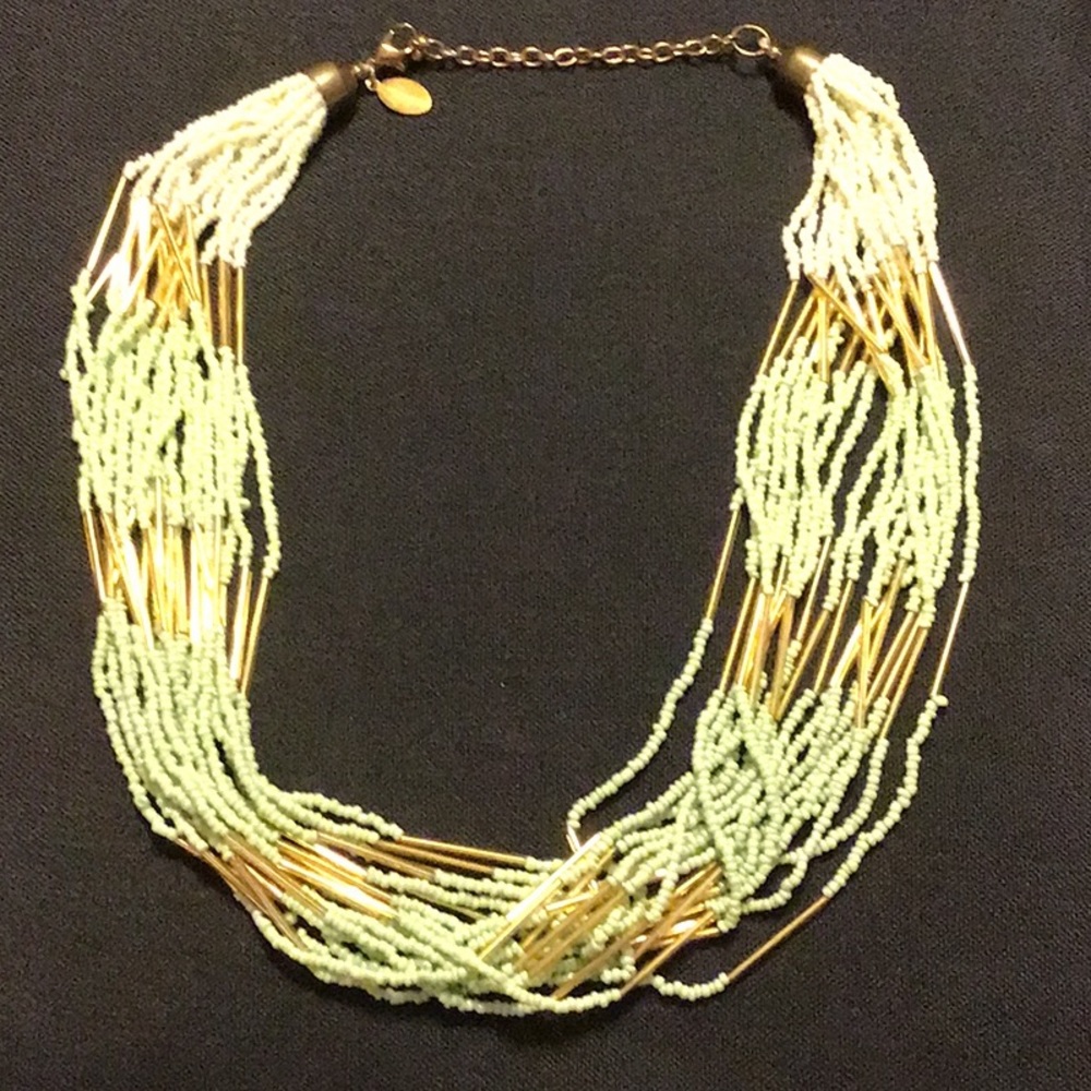 EUC 18” necklace.small beads goldstone light green and ivory color beads